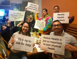 Vinnies Youth Members holding up signs advocating for mental health