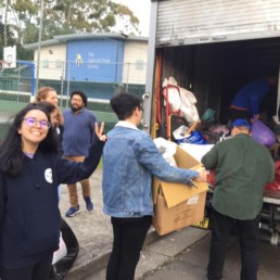 School students loading donations into Vinnies truck