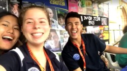 Three Vinnies Youth Members taking a selfie at a Vinnies Stall